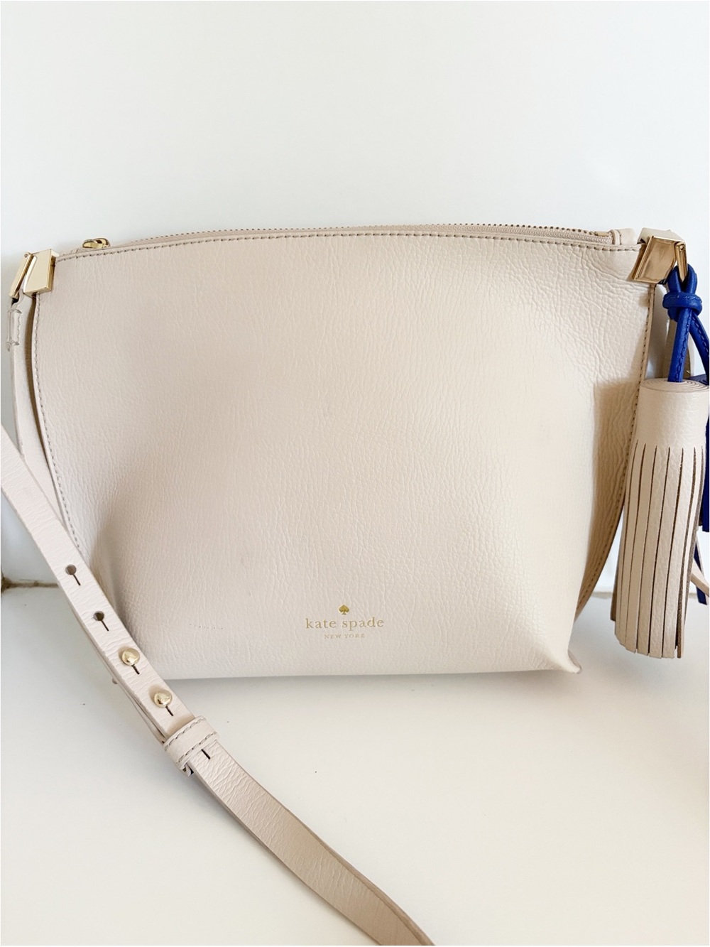 kate spade foster court leather crossbody bag with blue tassel accent